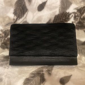 Convertible clutch-shoulder-x body. Used, like new